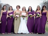 mismatching purple maxi dresses for bridesmaids and a strapless gold maxi gown for the maid of honor