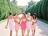 blush and light pink one shoulder short dresses and a coral pink dress for the maid of honor