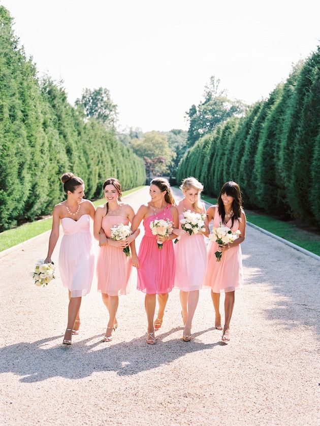 Blush and light pink one shoulder short dresses and a coral pink dress for the maid of honor