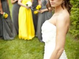 all the gals wearing matching grey maxi dresses and the maid of honor in a bright yellow one for a grey and yellow wedding
