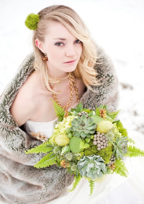 a greenery wedding bouquet with succulents, ferns, pinecones, thistles, a little bit of green and white blooms for a statement