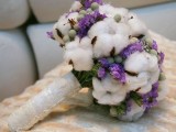a cotton wedding bouquet with berries and purple blooms plus a neutral wrap is a cozy and lovely winter wedding idea