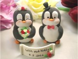 cute and lovely penguin cake toppers are a perfect idea for a relaxed modern wedding or for those who love animals