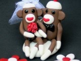 fun and colorful monkey wedding cake toppers showing off a bride and a groom are amazing and can be made of sugar for your cake