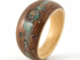 a wooden rings with some colorful inserts is a bold solution for a person who is into nature, woods and maybe elves and fairy-tales