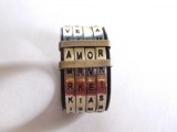 a creative and geeky engagement ring inspired by Scrabble is a cool solution for a geek couple
