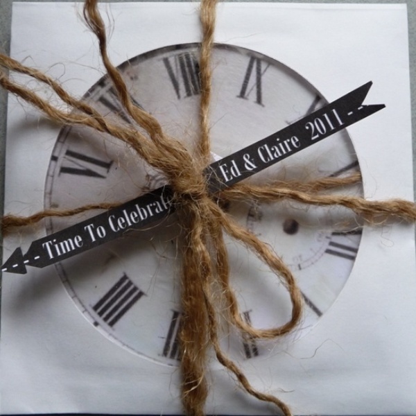 A clock with a tag and twine is a fun and simple wedding favor idea for a NYE wedding