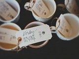 vintage teacups on the table with tags are lovely favors and cool escort card holders