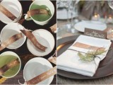 matching vintage teacups with brown escort cards for a woodland wedding