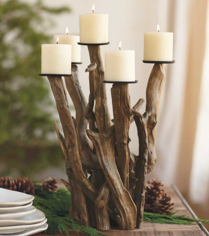 A driftwood candelabra with candles is a nice decoration for a coastal or beach wedding