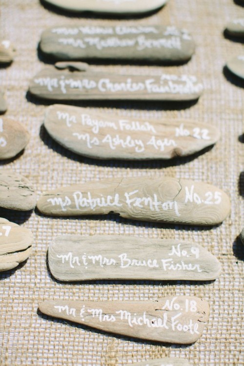 driftwood escort cards are great for a beach or coastal wedding, it's a cute way to embrace the location