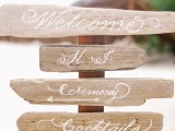 wedding signage made of driftwood is a cool idea for a coastal wedding, it’s a very eco-friendly idea