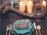 driftwood used to make place cards is a very creative and budget-friendly idea – just take driftwood and right the names