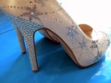 white wedding shoes with silver rhinestone snowflakes are amazing to accent your bridal look, they will shine and add interest to your outfit
