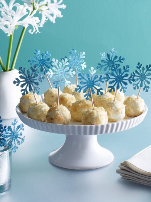sweets topped with blue snowflake toppers are amazing for a winter wedding - you can turn your simple desserts into winter ones easily