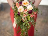 a pretty cascading wedding bouquet of neutral, pink, fuchsia blooms and cascading greenery is a bold and catchy idea for a summer or fall bride