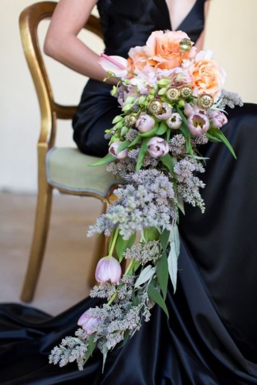 a delicate pastel cascading wedding bouquet with blush and lilac blooms, roses and tulips is a chic idea for spring