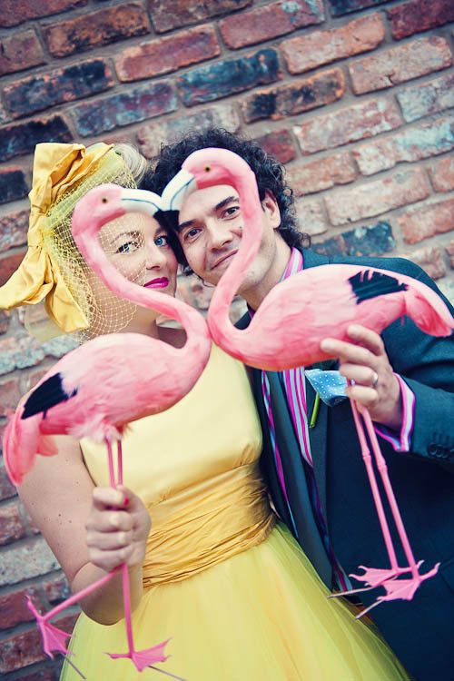 your wedding portraits will look funnier and cooler with pink flamingo statuettes, try that