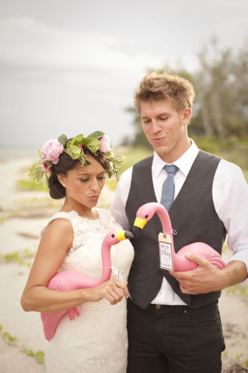 plastic pink flamingos with tags are amazing as wedding favors for a fun touch, they will decorate somebody's lawn