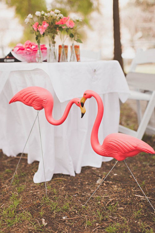 coral pink flamingos that echo with blooms and petals will give a bright touch of color to your space
