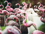 a bridal portrait in a flock of pink flamingos is a gorgeous, dreamy and unique idea that will help you stand out
