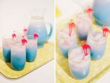 blue cocktails topped with pink domingo toppers are amazing for a wedding or any pre-wedding party, they look super tropical and cool