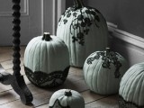 elegant pale green pumpkins decorated with black lace are adorable for styling any space for a Halloween party including a bridal shower
