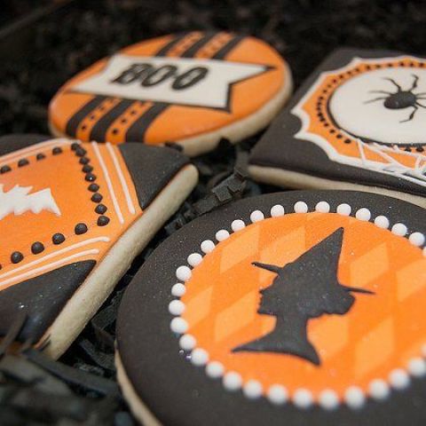 black and orange Halloween glazed cookies are perfect for a Halloween party, bridal shower or a wedding and can be used as favors, too