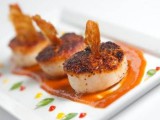 scallops with tomato sauce and herbs are delicious for a seafood-loving wedding in any season