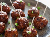 meatballs with herbs on toothpicks are an easy and tasty winter wedding appetizer