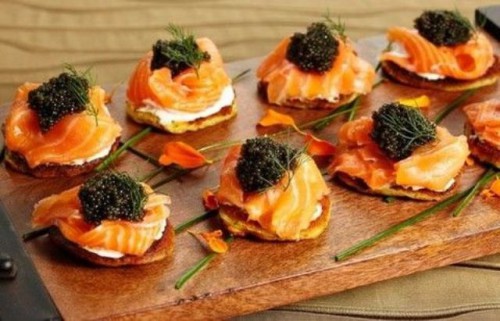 crackers with cream cheese, salmon, caviar and herbs is amazing for those who love seafood and Japanese cuisine
