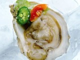 oysters with a bit of herbs and hot sauce are amazing for a seafood-loving wedding
