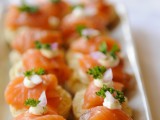 crackers with salmon and herbs and cream cheese are delicious winter wedding appetizers