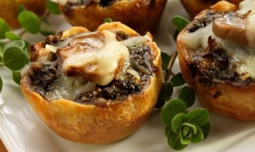 stuffed mushrooms with cheese and meat are delicious and hearty winter wedding appetizers