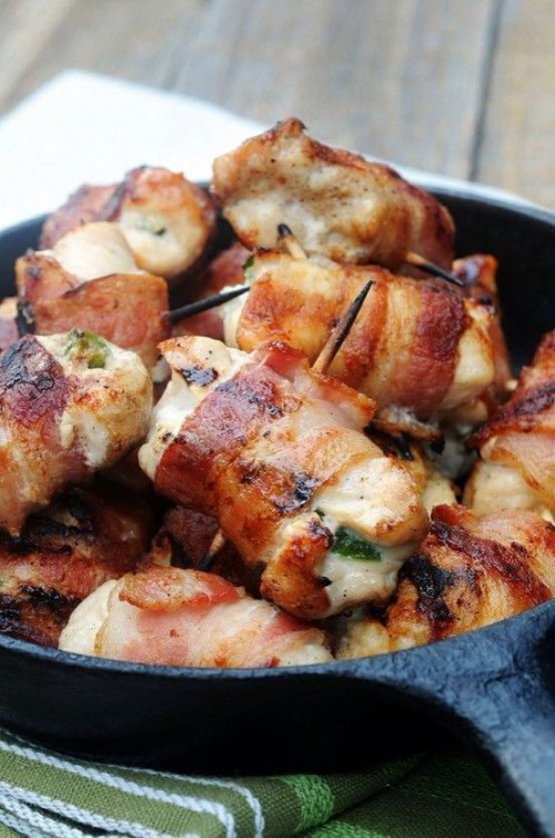 chicken pieces wrapped with bacon and placed on skewers are delicious and very nutrious winter wedidng appetizers