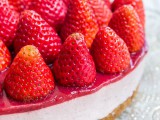 a strawberry wedding cheesecake with fresh berries is a delicious dessert for every wedding