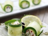 wrapped cucumber slices filled wiht herb and veggie salad inside and refreshed with lime